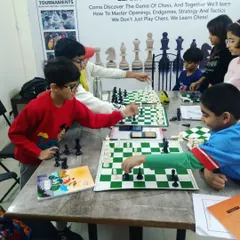 Students in our beginner's chess batch are deeply focused on their games. With professional coaching and practice puzzles, they learn the fundamentals of strategy and tactics.