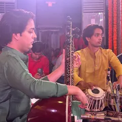 Tuning the sitar during the Sankat Mochan performance. Every detail is important when you are making a musical offering at such a sacred event.