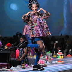 Capturing the fun and energy on the Lakme Fashion Week runway. For this model, I built a tall, structured updo with multiple buns, creating a playful and artistic silhouette that stood out on the catwalk.