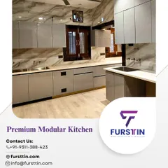 This L-shaped kitchen features a sophisticated two-tone design with light grey high-gloss cabinets and a marble-patterned backsplash. The handle-less design and clean lines contribute to a sleek, minimalist aesthetic that feels spacious and modern.