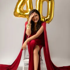 A candid moment of laughter during her 40th birthday shoot. These are the moments I love to capture, the ones filled with genuine joy and celebration.