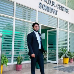 My practice extends across the NCR, including the District Court in Sonipat. Here I am outside the A.D.R. Centre, ready for a day of hearings.