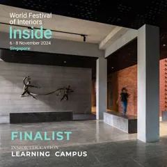 A key interior space at the Bosch Learning Campus, a finalist at the World Festival of Interiors. The design features a dynamic sculpture and exposed concrete, creating a social spine that encourages interaction and movement.