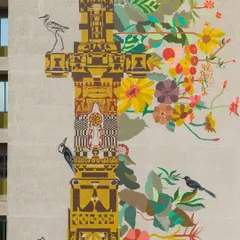This section of the 'Tower of Harmony' highlights the fusion of heritage motifs and natural elements. The artwork is designed to be explored, with soft references to mythological creatures that encourage viewers to find their own stories within the forms.