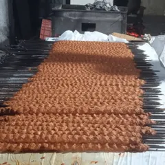 Getting the beef seekh kebabs ready for the grill. We prepare hundreds of these for large wedding orders.