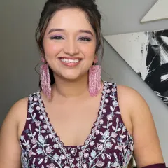 A beautiful smile from my happy bride. The colorful makeup perfectly matches her vibrant personality and the fun atmosphere of a pool party.