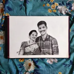 Here is another view of the finished mother and son graphite sketch. The A3 size allows for plenty of detail in the expressions and clothing, creating a full and realistic portrait.