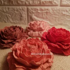 A closer look at the rich colors and textures of our Peony aroma diffusers. Each one is hand-poured and colored, making every flower unique.
