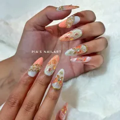 A peachy, butterfly-themed set with milky gold details and pearl accents. We can get as creative as you want.