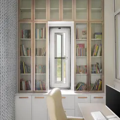 This is the final look of the study nook, built around a window to maximize natural light. The floor-to-ceiling library provides ample book storage, with a mix of glass-fronted and closed cabinets in a two-tone finish.