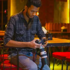 Reviewing shots on the back of the camera is a key part of my process. I make sure we are capturing the vision we discussed throughout the shoot.