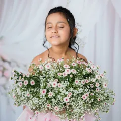 A moment of pure bliss, with her eyes closed and a gentle smile.