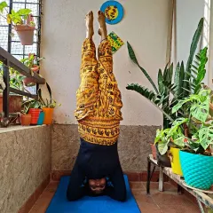 Sometimes you need a different angle to look at the world. Here I am in Sirsasana, or headstand, an inversion that improves circulation, calms the nervous system, and builds upper body strength.