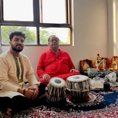 This is a moment of receiving blessings from my father and guru, Shri Naveen Kumar. The Guru-Shishya Parampara, or the teacher-disciple tradition, is the foundation of my music and my teaching.