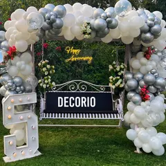 Here is another version of the anniversary swing decor, this time for a 5th anniversary. The setup is easily customizable with different marquee numbers to celebrate any milestone, big or small.