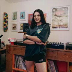 A more relaxed moment in my home studio. You can see my Pioneer DJ controller and some of the art that inspires me, creating a space that's all about good energy and creativity.