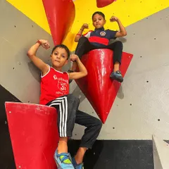 This picture says it all. I help kids build confidence and strength they never knew they had. Seeing them reach the top and feel like superheroes is the best part of my job.