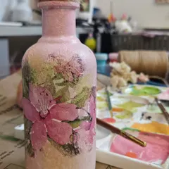 Another look at my finished decoupage bottle. The art of decoupage has a rich history, and I love continuing that tradition by creating these unique, textured decor pieces by hand.
