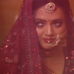 Crafting a dreamy, traditional bridal look for a beautiful bride in Varanasi. The focus here was on creating a soft, romantic feel with dramatic eyes that shine through the veil.