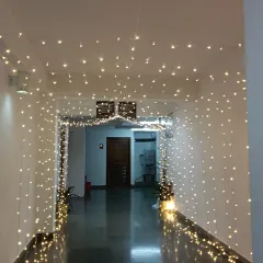 The fairy light entranceway for the engagement ceremony, glowing warmly and creating an enchanting atmosphere for the event.