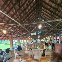 The covered seating area at one of Kolkata's premier clubs, fully furnished by us. Our all-weather wicker chairs provide comfortable seating for members year-round.