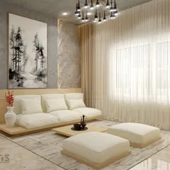 In the same Indian Bohemian home, this seating area uses a low-profile sofa and a neutral palette to create a calm, minimalist zone. The large artwork and textured wall add depth, while sheer curtains diffuse natural light beautifully.