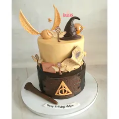 A magical two-tier Harry Potter cake for a young wizard's 8th birthday! This design was packed with details like the Sorting Hat, Golden Snitch, and flying keys, all handcrafted with minimal fondant. Both tiers were a rich dark chocolate, perfect for a magical feast.
