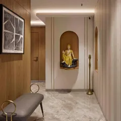 The entrance to this home sets a spiritual and welcoming tone. A serene Buddha statue sits in a warm, illuminated niche, creating a sense of calm from the moment you step inside. The wood paneling and striped wallpaper add texture and depth.