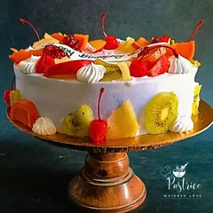 A celebration of freshness, my Exotic Fruit Cake is loaded with seasonal fruits like kiwi, orange, and pomegranate over a light vanilla sponge. It's a wonderfully light and refreshing option for any occasion.