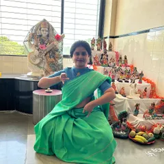 Celebrating the second day of Navratri by paying obeisance to Brahmacharini. Here I am in front of our family's Golu display, using mudras to symbolize the Japamala and Kamandal she holds.