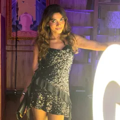 A candid shot from the GQ party, enjoying the glamorous atmosphere.