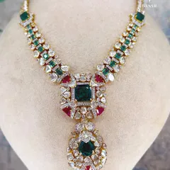 This necklace is heavy in craftsmanship and grand in its presence. I designed it by combining large uncut diamonds with heirloom-scale emeralds and rubies for a clean, bold, and unforgettable bridal statement piece.