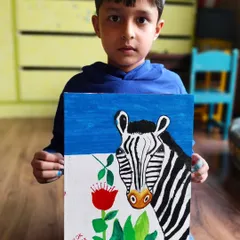 Exhibition-worthy paintings by my students! This zebra piece took two hours of patience, lots of paint spills, and plenty of laughter, but the stunning result was so worth it.