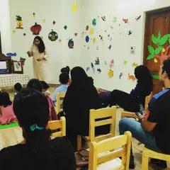 Here I am in the middle of a musical storytelling event for preschoolers. You can see both parents and children are completely absorbed, which is exactly what I aim for in these family workshops.