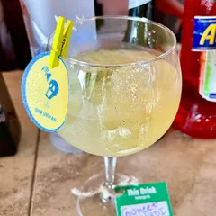 A personalized drink with a custom tag for a guest named Guneet. We can create these for your entire guest list or for special members of your party, making everyone feel like a VIP.