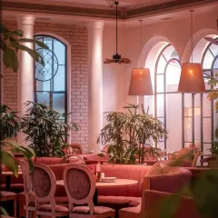 Cozy, plush seating bathed in the warm glow of our pretty lights. This is a space designed for comfort and intimate conversations, where evenings unfold gently.