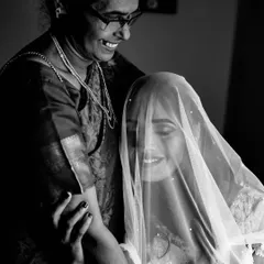 A priceless, candid moment between the bride and her mother. Capturing these loving family interactions is a cherished part of the wedding story.
