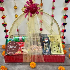 Our Diwali hampers are a whole vibe! This one is packed with sweets, savouries, drinks, and even a beautiful aroma diffuser. I make sure every hamper feels like a complete celebration in a box.