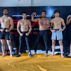 Our warriors, a lineup of dedicated fighters ready to take on any challenge. The physique shows the results of our intense training programs.