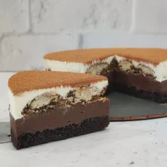 A slice of heaven. Our Tiramisu Cheesecake has a rich coffee flavor balanced by creamy mascarpone, making it an elegant and indulgent dessert.
