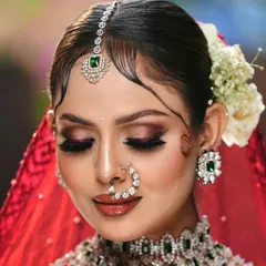 A close-up on the details. This image highlights the blended eyeshadow, precise liner, and flawless skin finish that are hallmarks of the professional training our students receive.