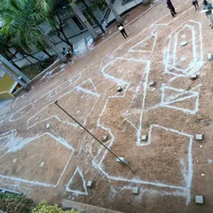 A behind-the-scenes look at the initial phase of the Atria University project. The design is marked out with chalk on the ground, showing the meticulous planning that goes into executing a large-scale landscape.