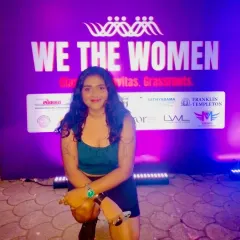 A photo from the 'We The Women' red carpet. I'm comfortable and professional at large-scale media events.