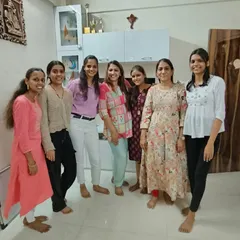 A casual moment with some of our dedicated students after a long day of practice. The community and friendships built during our courses are just as important as the art.