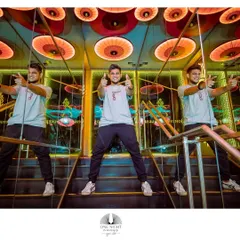 A fun and creative shot taken in a mirrored staircase at a venue. I always try to bring a playful and energetic attitude to my work.