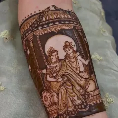 For brides who want a touch of the divine, I specialize in spiritual portraits like this beautiful depiction of Radha and Krishna on a swing, bringing blessings to your new beginning.