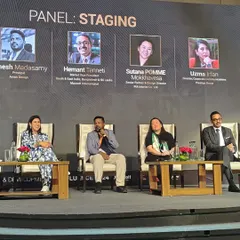 Another view of the 'Staging' panel, showing the engaging discussion between industry leaders.