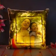 Surprise them with a personalized LED cushion that literally glows. Your photo is printed on the front, and with the flick of a switch, the border lights up, making it a unique and cozy addition to any room.