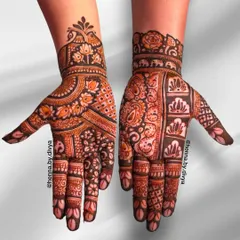 A design showcasing a mix of different traditional patterns. It includes paisleys, lotuses, and various geometric fillers, demonstrating versatility in style.