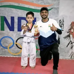 Even my youngest players are champions. Here is a little warrior with his well-earned medal and trophy, showing the strength and spirit we build at the academy.
